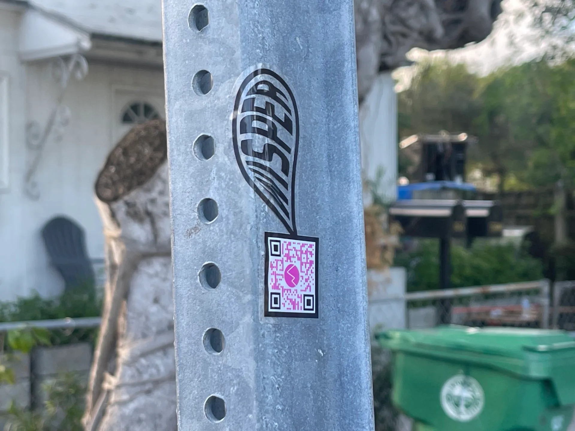 Wisper sticket on a metal bar