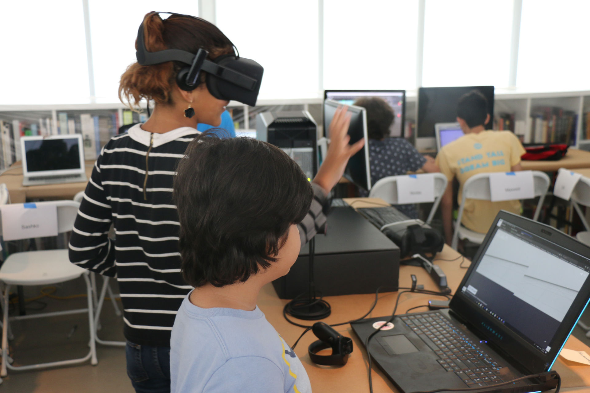 Kids playing while using an Oculus at XRCamp