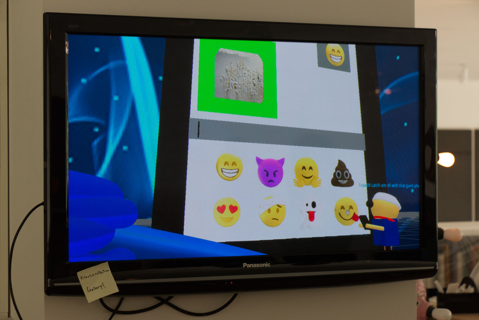 Screen with emojies at XRCamp De La Cruz collection