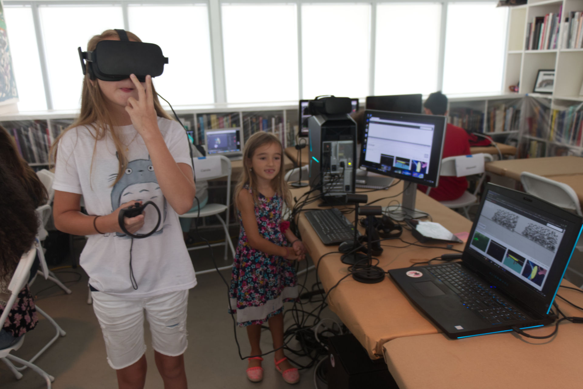 A girl using Oculus at XRCamp